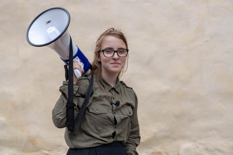 Ia Anstoot holds loudhailer at the launch of her Dear Greenpeace campaign calling on the environmental NGO to drop its decades old policy of opposing low-carbon nuclear power.